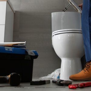 male-plumber-working-fix-problems-client-s-house